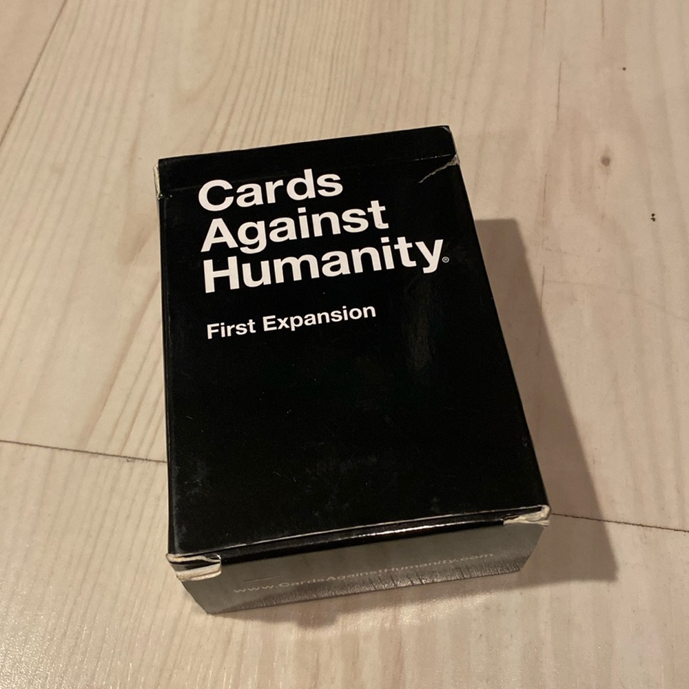 Cards Against Humanity first expansion pack of cards